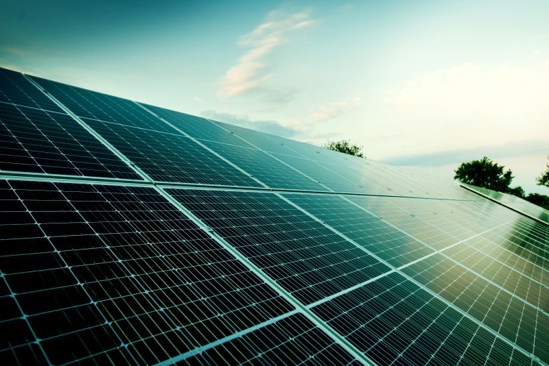 Solar panels on a background of blue sky. Solar panels, photovoltaic, alternative power source - selective focus, copy space